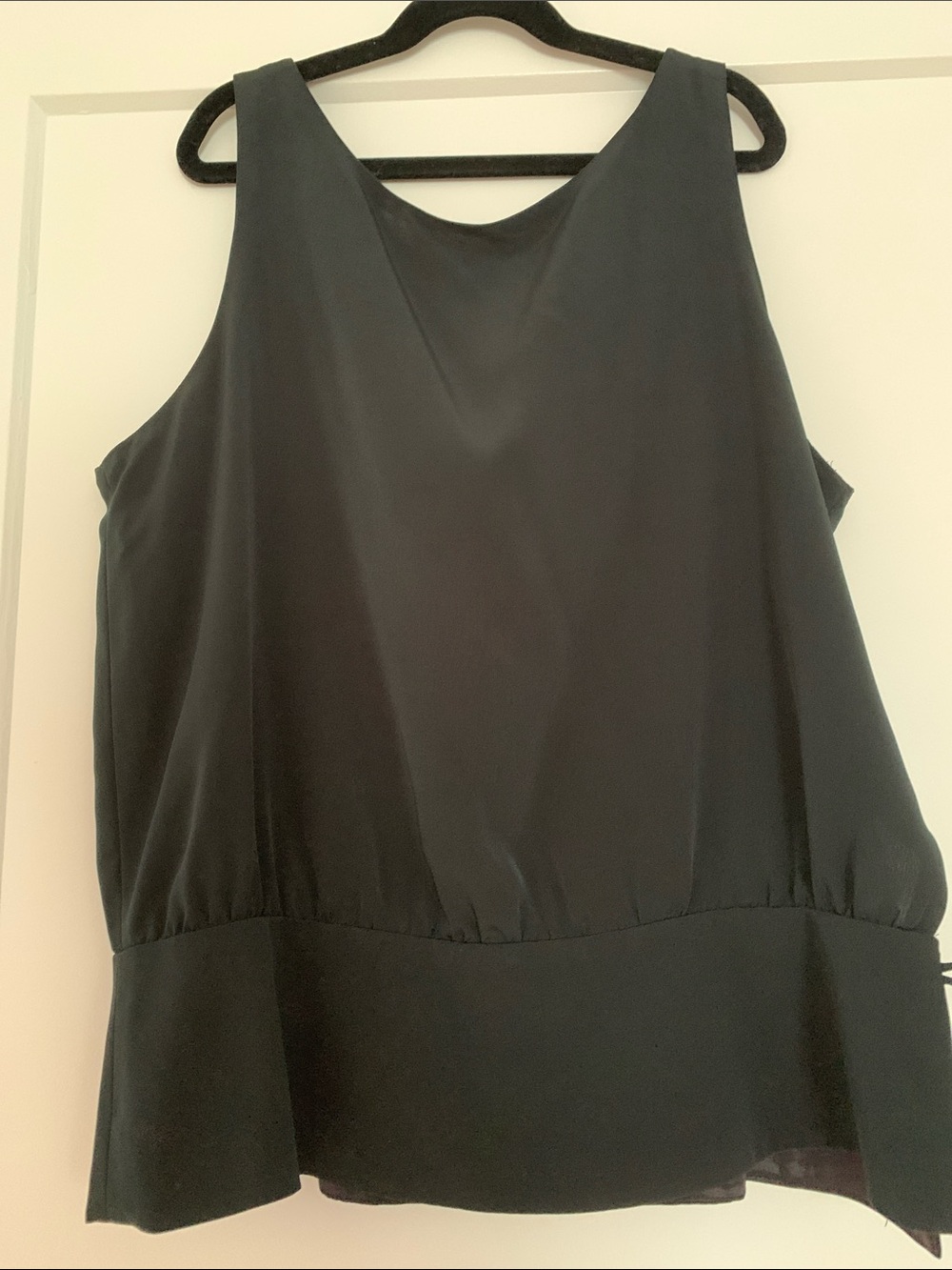 Black Sleeveless Peplum Top